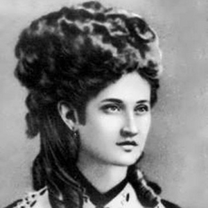Black and white painting of woman with extravagant hair.